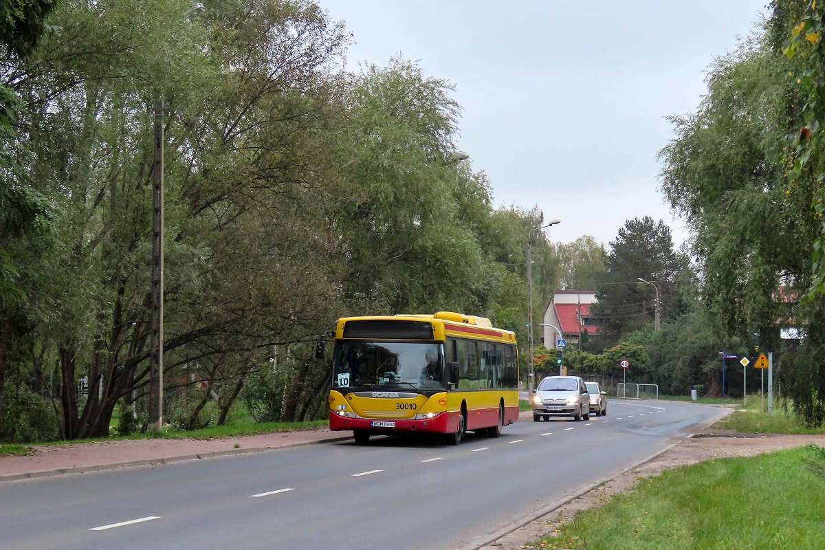 30010
Scania jedzie jako kurs linii numer 10 â Grodzisk Maz. Dw. PKP (12:10)-KsiÄĹźenice Marylskiego âAgri-Rolâ (12:42). 
