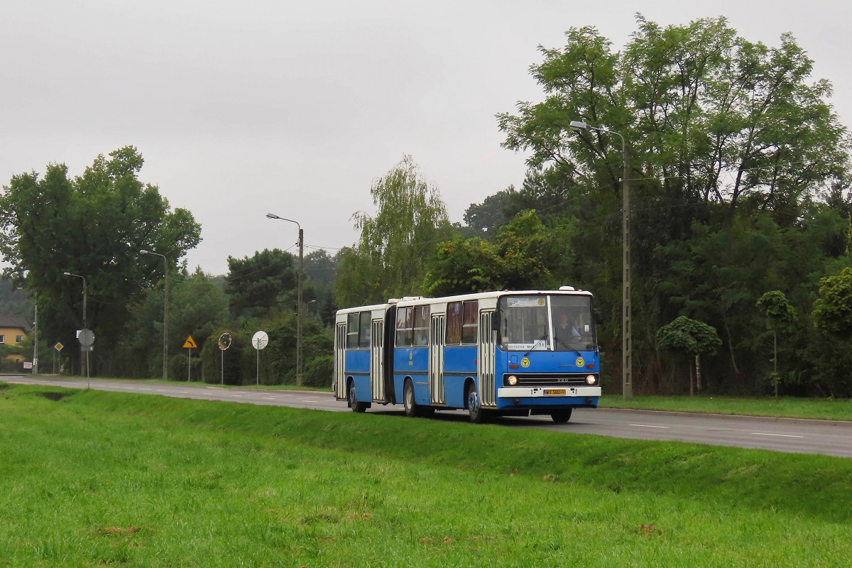 RV52
Ikarus jedzie jako kurs specjalny linii numer 31 â Ĺťabia Wola UrzÄd Gminy (8:56)-Grodzisk Maz. Dw. PKP (9:20). 
