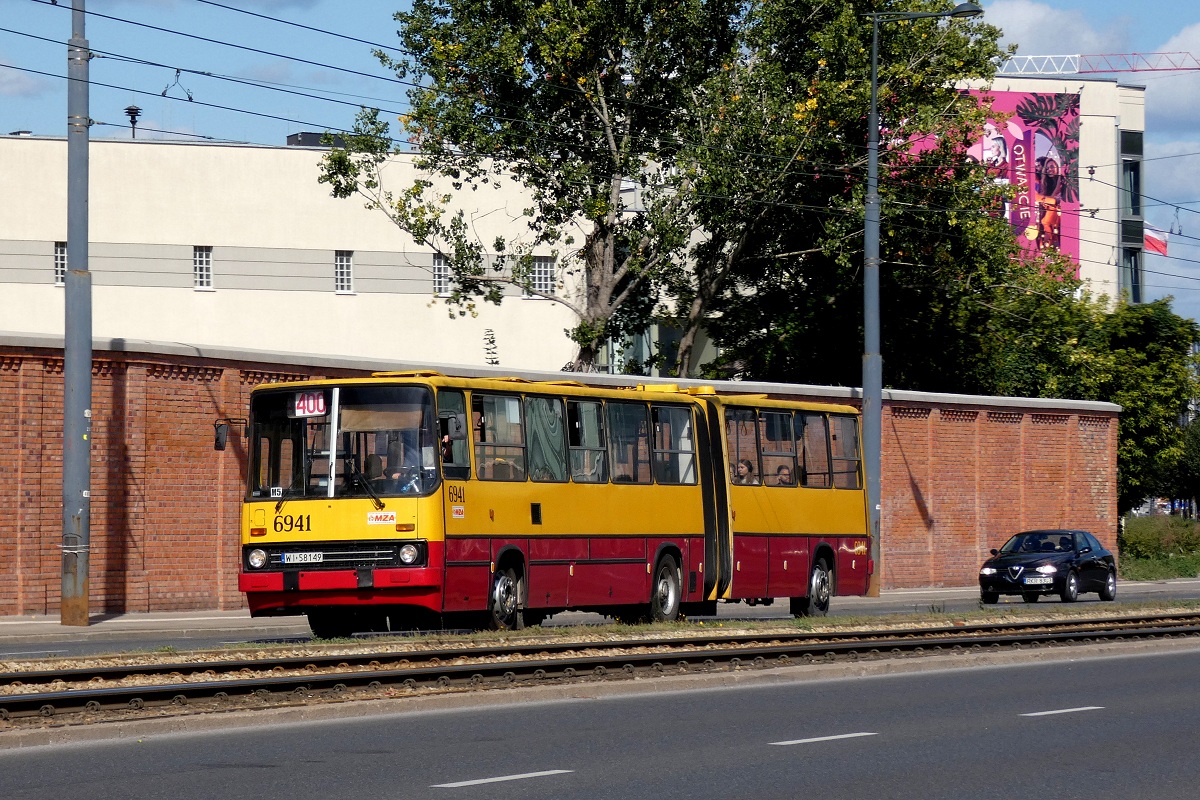 6941
Ikarus wykonuje kurs linii numer 400 w relacji PowÄzki Cm. Wojskowy (13:00)-Powsin Park Kultury (13:56). 
Słowa kluczowe: IK280