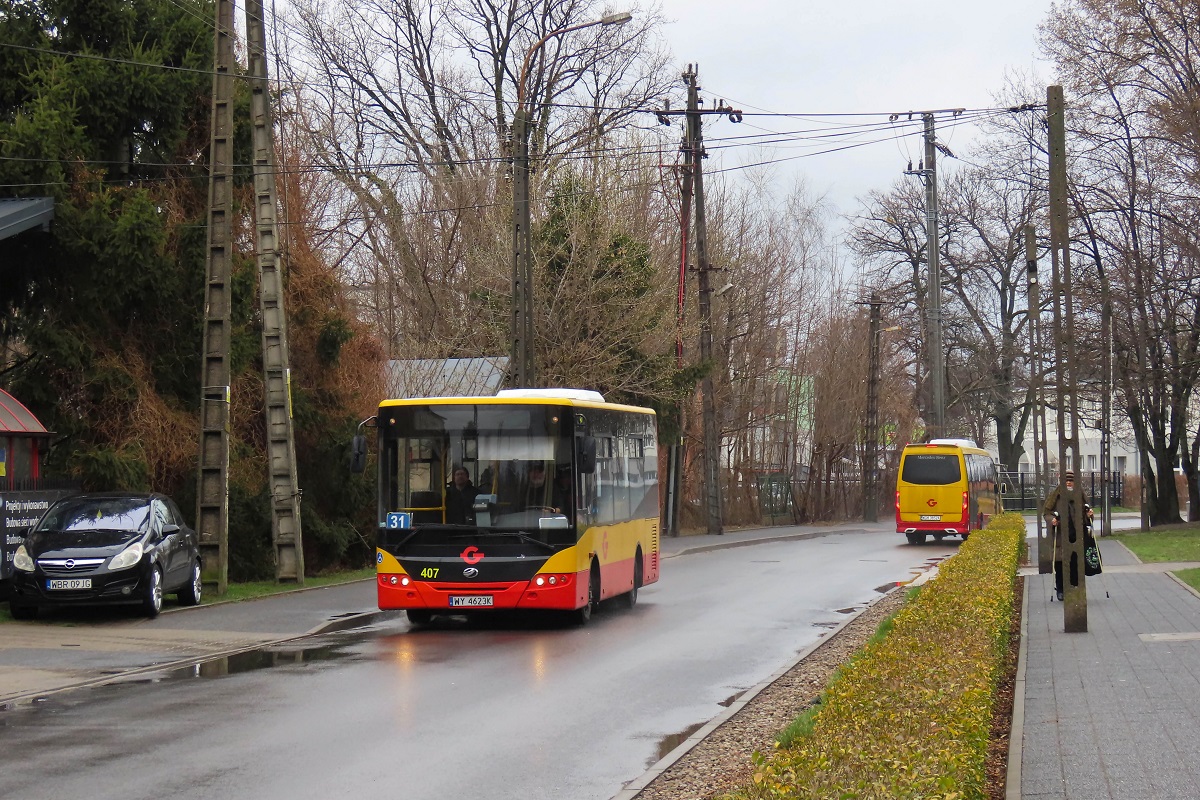 407
ZAZ jedzie jako kurs â119/221â linii numer 31 â Grodzisk Maz. Dw. PKP (13:15)-Petrykozy Trakt KrĂłlewski (14:23)-Grodzisk Maz. Dw. PKP (15:14). W tle widoczny jest Mercedes-Benz 516 CDI / Mercus MB Sprinter City #204 jako kurs â217â linii numer 34 â Ĺťabia Wola UrzÄd Gminy (13:02)-Grodzisk Maz. Dw. PKP (13:30). 

