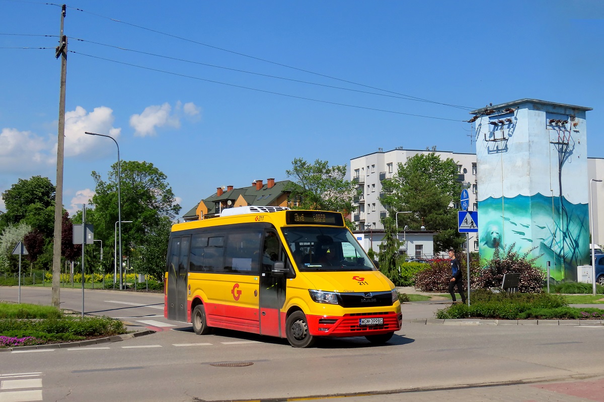 211
MAN jedzie jako kurs â121â linii numer 34 â Grodzisk Maz. Dw. PKP (15:25)-Ĺťabia Wola UrzÄd Gminy (15:52). 
Słowa kluczowe: objazd