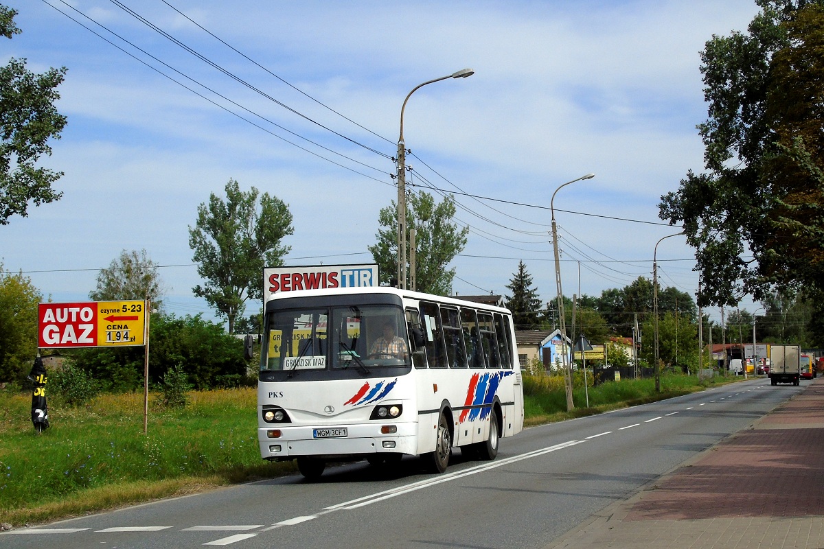 60023
Tramp zjeĹźdĹźa na bazÄ po wczeĹniejszym wykonaniu kursu "1011" linii podmiejskiej w relacji Warszawa BielaĹska (8:25)-Grodzisk Maz. Ĺťyrardowska (9:47). 
