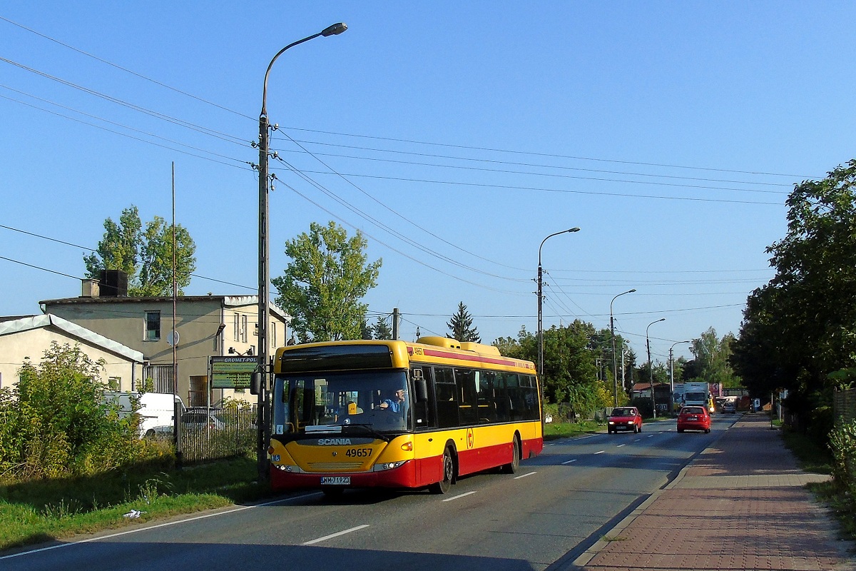 49657 (80256)
Scania jedzie sĹuĹźbowo z Brwinowa (gdzie obsĹugiwaĹa poranne kursy na linii miejskiej B1) do grodziskiej bazy PKS Grodzisk na przeglÄd na linii diagnostycznej. 
