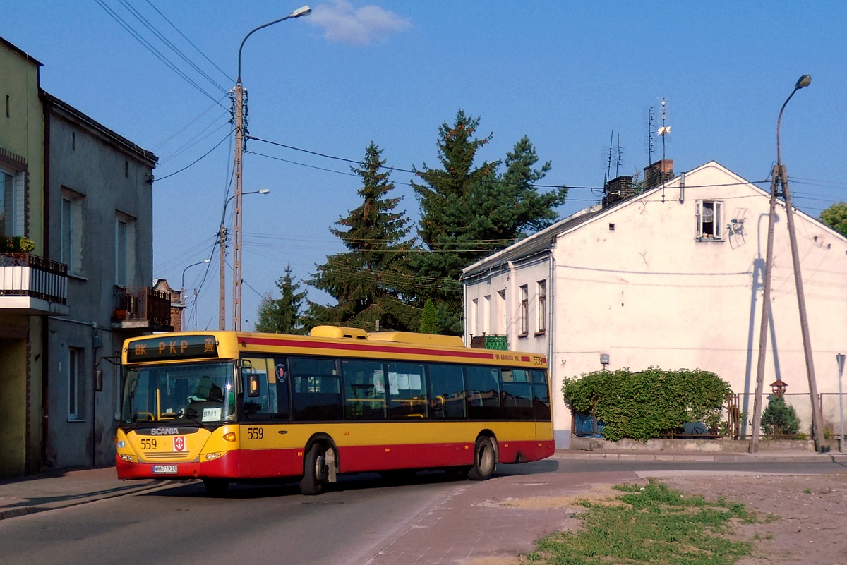 80259
Scania (ex. A559) jedzie w obsĹudze kursu "5451" linii przyspieszonej BK w relacji Grodzisk Maz. Dw. PKP (7:50)-Grodzisk Maz. Dw. PKP (8:08) p. Grodzisk Maz. Os. Teligi (7:59). 
