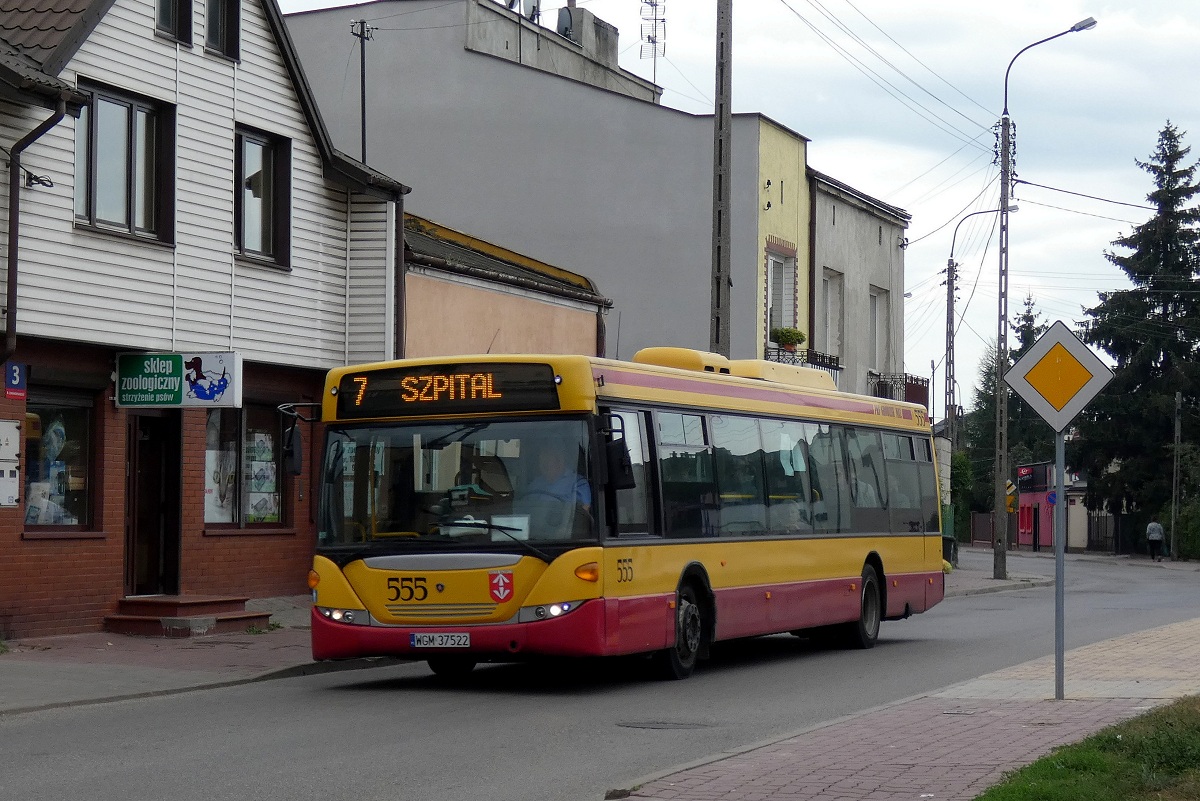 80255
Scania (ex. A555) jedzie w obsĹudze kursu "5" linii numer 7 w relacji Grodzisk Maz. Szpital (9:50)-Grodzisk Maz. Szpital (10:28) p. Grodzisk Maz. Os. Teligi (10:09). 
Słowa kluczowe: DziwadĹo