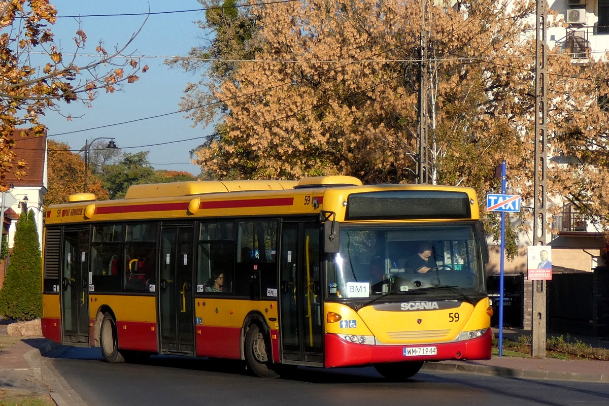 80261
Scania (ex. 49659, ex. A561) jedzie w obsĹudze kursu "5701" linii przyspieszonej BM w relacji Grodzisk Maz. Dw. PKP (16:00)-MakĂłwka (16:15). 
