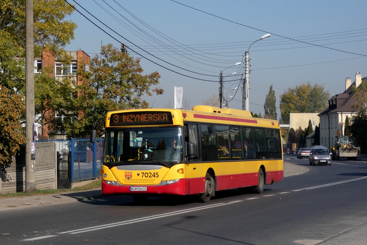 70245
Scania (ex. A545, ex. 49651) jedzie w obsĹudze kursu linii numer 3 w relacji PiastĂłw Warszawska (12:15)-PruszkĂłw InĹźynierska (12:29). 
Słowa kluczowe: DziwadĹo