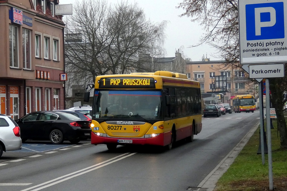 80277
Scania (ex. A577) jedzie w obsĹudze kursu ZKA w relacji PKP Grodzisk Mazowiecki-PKP PruszkĂłw. Linia zostaĹa uruchomiona w zwiÄzku z wstrzymaniem ruchu kolejowego pomiÄdzy Grodziskiem a Pruszkowem. W tle widoczna jest Scania CN270UB 4x2 EB #80304 (ex. 49681) w obsĹudze kursu â5520â linii numer 3 w relacji Grodzisk Dw. PKP (13:30)-KĹudzienko PÄtla (13:55). 

